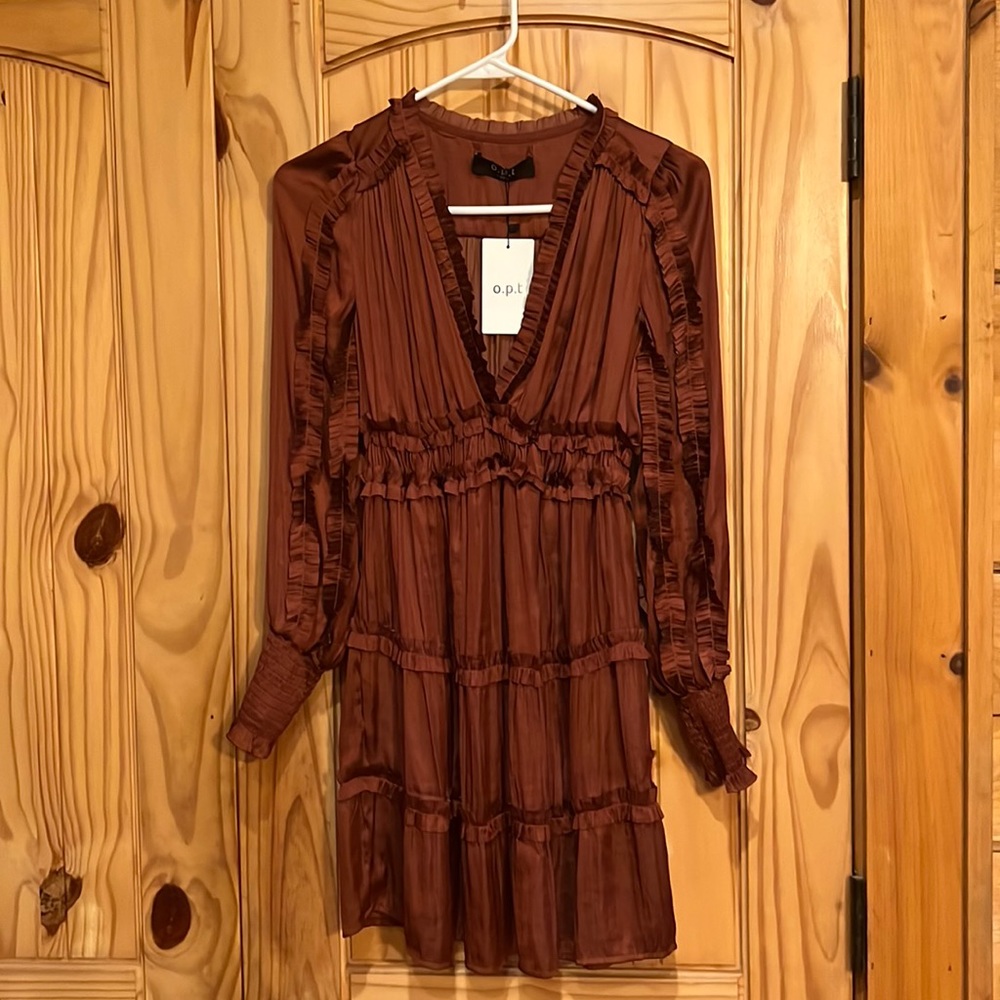 Silk look rust colored dress. New with tags!